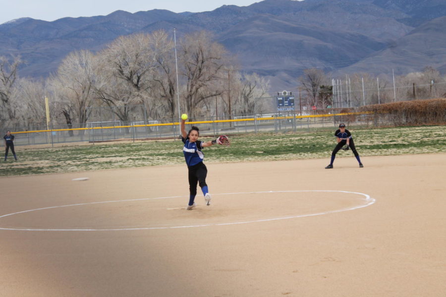 MaNeSe Braithwaite pitching with Jenna Andersen at 2nd
Photo by: BUHS Yearbooks Staff