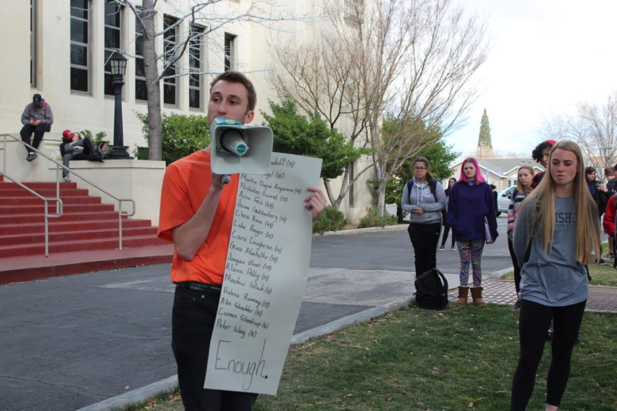 Jordan Kost held a list of the victims lost in the shooting. 