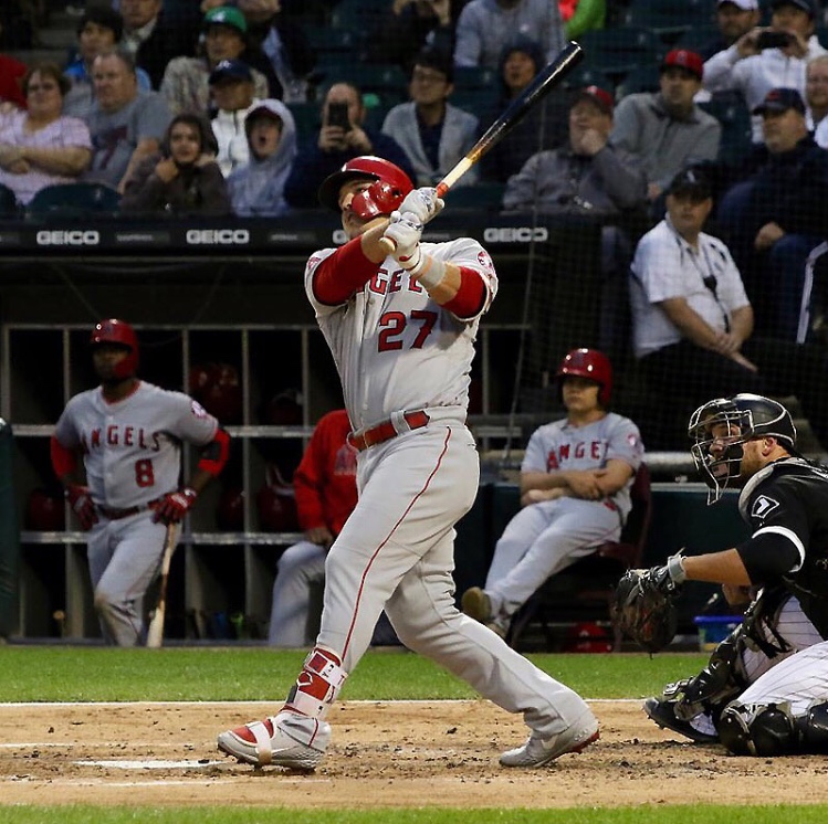 Mike Trout hitting a home run against the Chicago White Sox. Photo by MLB